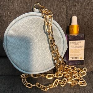 Truly purple rain face serum and mini purse